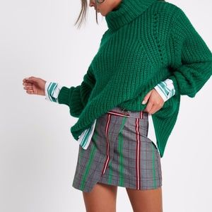 River Island Green check popper front skort